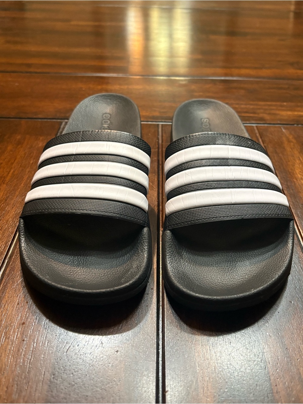Adidas black slides with white stripes, Men’s 10